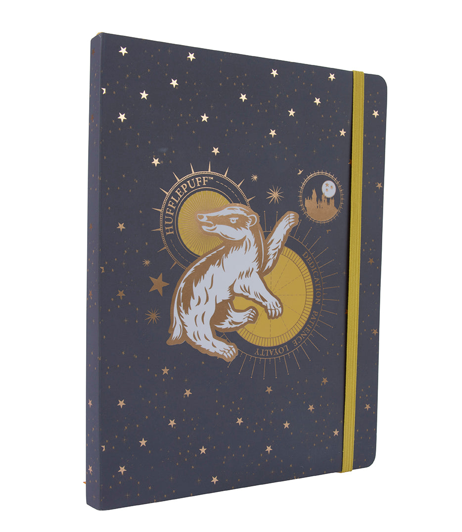 Harry Potter Hufflepuff constellation softcover notebook by Insight Editions, featuring a celestial Hufflepuff design on the cover.