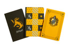 Set of three Harry Potter Hufflepuff softcover pocket notebooks from Insight Editions with Hufflepuff house designs and logos.