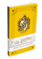 Set of three Harry Potter Hufflepuff pocket notebooks by Insight Editions featuring softcover covers with Hufflepuff house designs.