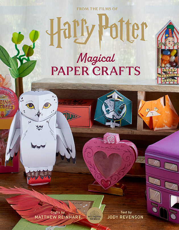 Softcover Harry Potter: Magical Paper Crafts book by Insight Editions with colorful Harry Potter-themed paper craft illustrations.