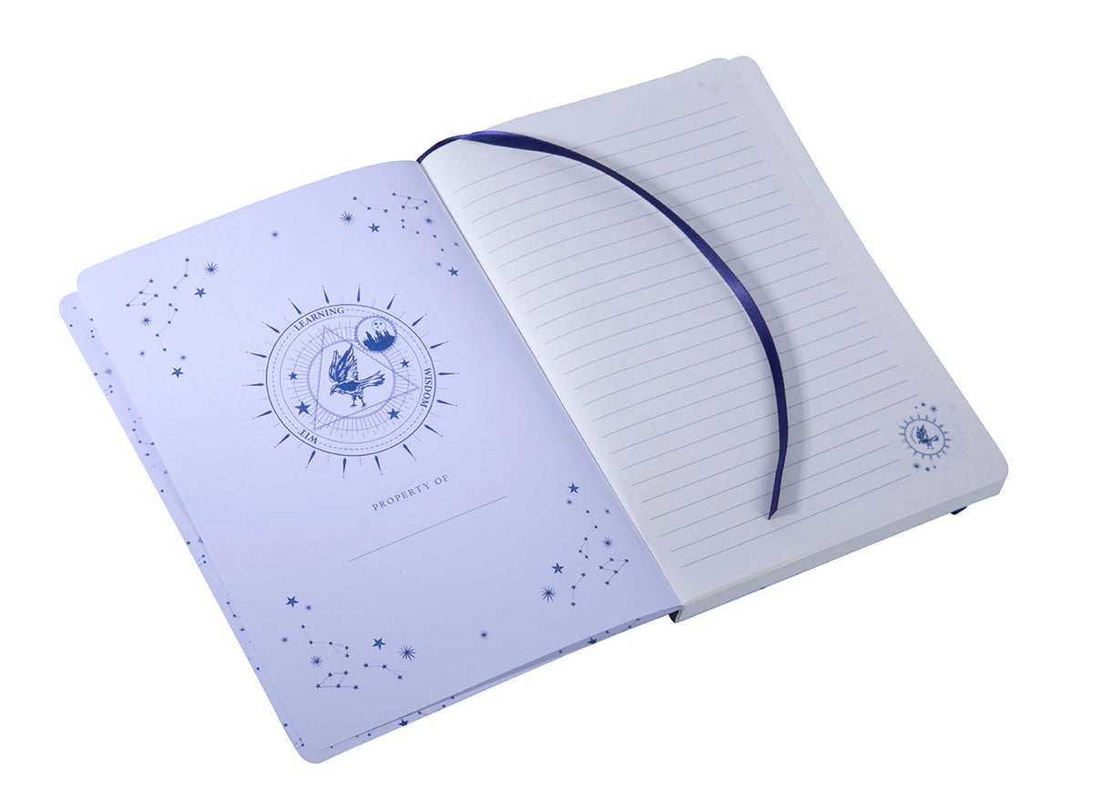 Interior of Harry Potter Ravenclaw Constellation softcover notebook by Insight Editions, featuring celestial-themed pages and artwork.