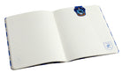 Inside view of Harry Potter Ravenclaw Notebook and Page Clip Set by Insight Editions, featuring lined pages and decorative clips.