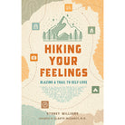 Softcover book titled "Hiking Your Feelings" by Insight Editions, featuring a nature-inspired cover design.