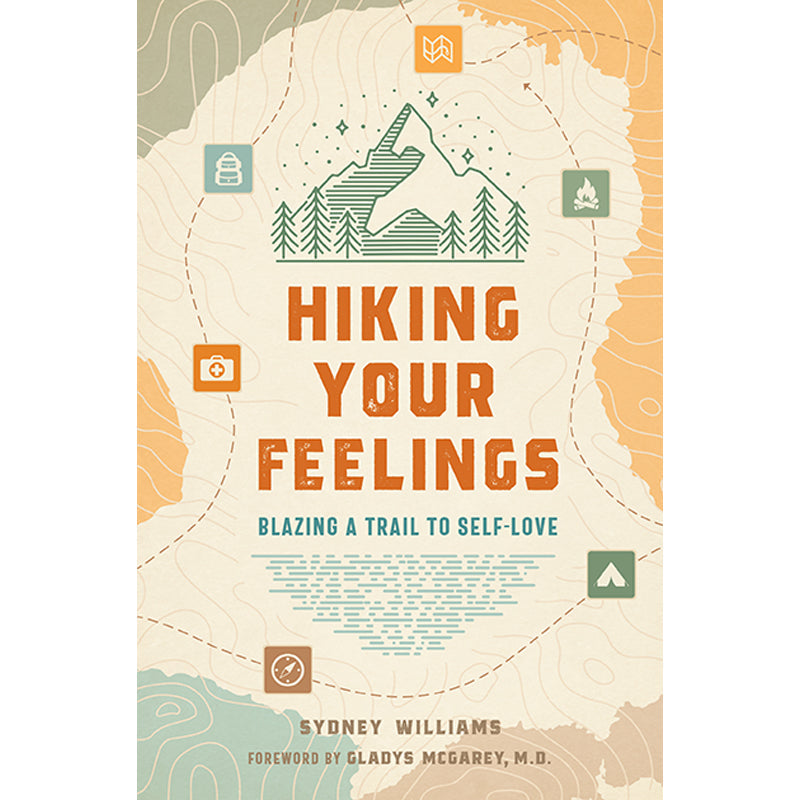 Softcover book titled "Hiking Your Feelings" by Insight Editions, featuring a nature-inspired cover design.