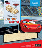 Softcover Disney Pixar Cars 3 Lightning McQueen book and 3D wood model by Insight Editions, featuring colorful car illustrations and assembly parts.