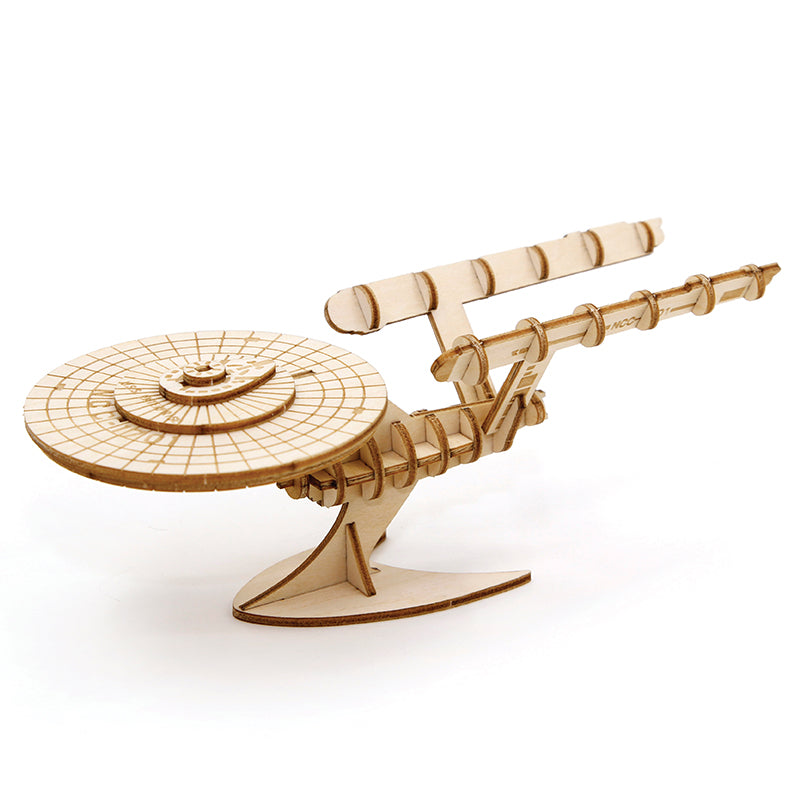 Softcover IncrediBuilds Star Trek U.S.S. Enterprise book with 3D wood model by Insight Editions, featuring a detailed spaceship illustration.