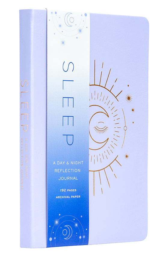 Softcover book titled "Sleep" by Insight Editions, featuring a calming cover design, lying open on a wooden surface.