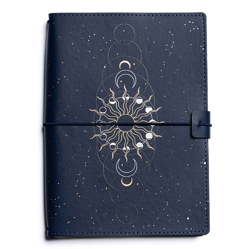 Softcover Sun Moon Rising Astrology Notebook Set by Insight Editions with celestial-themed covers and detailed astrology designs.