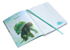 Inside view of The Dark Crystal Bestiary Creatures softcover notebook by Insight Editions, featuring illustrated pages and creature sketches.