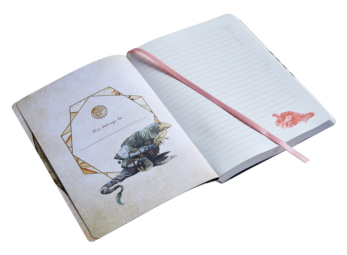 Inside view of The Dark Crystal Mystic softcover notebook by Insight Editions, showing lined pages with themed illustrations.