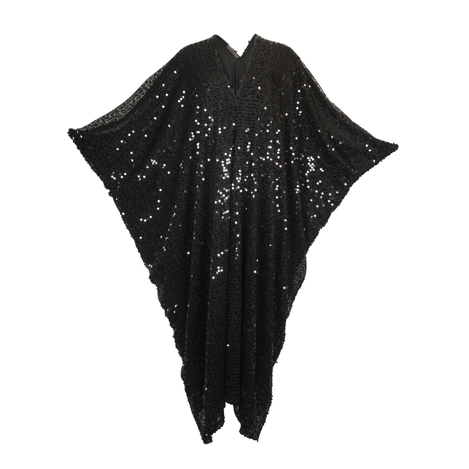 Black sequin caftan dress by Jennafer Grace featuring a flowy design and shimmering sequin embellishments.