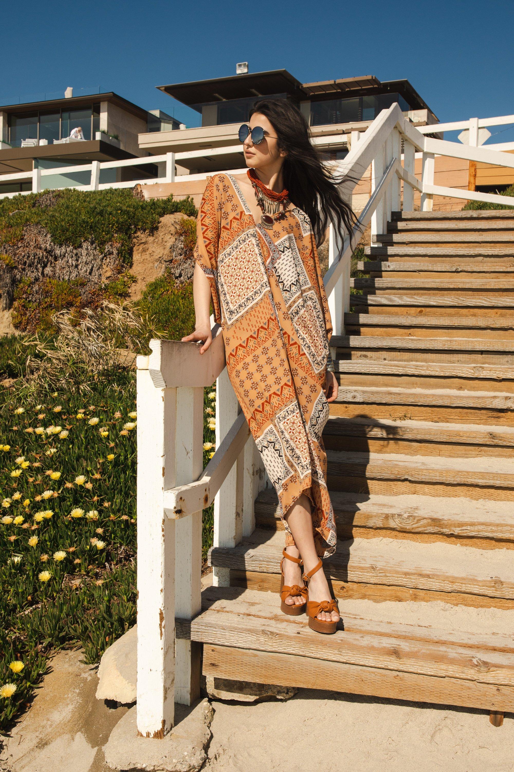 Handmade Hera Caftan by Jennafer Grace, lightweight fabric with intricate patterns, flowing long-sleeve design for elegant wear.