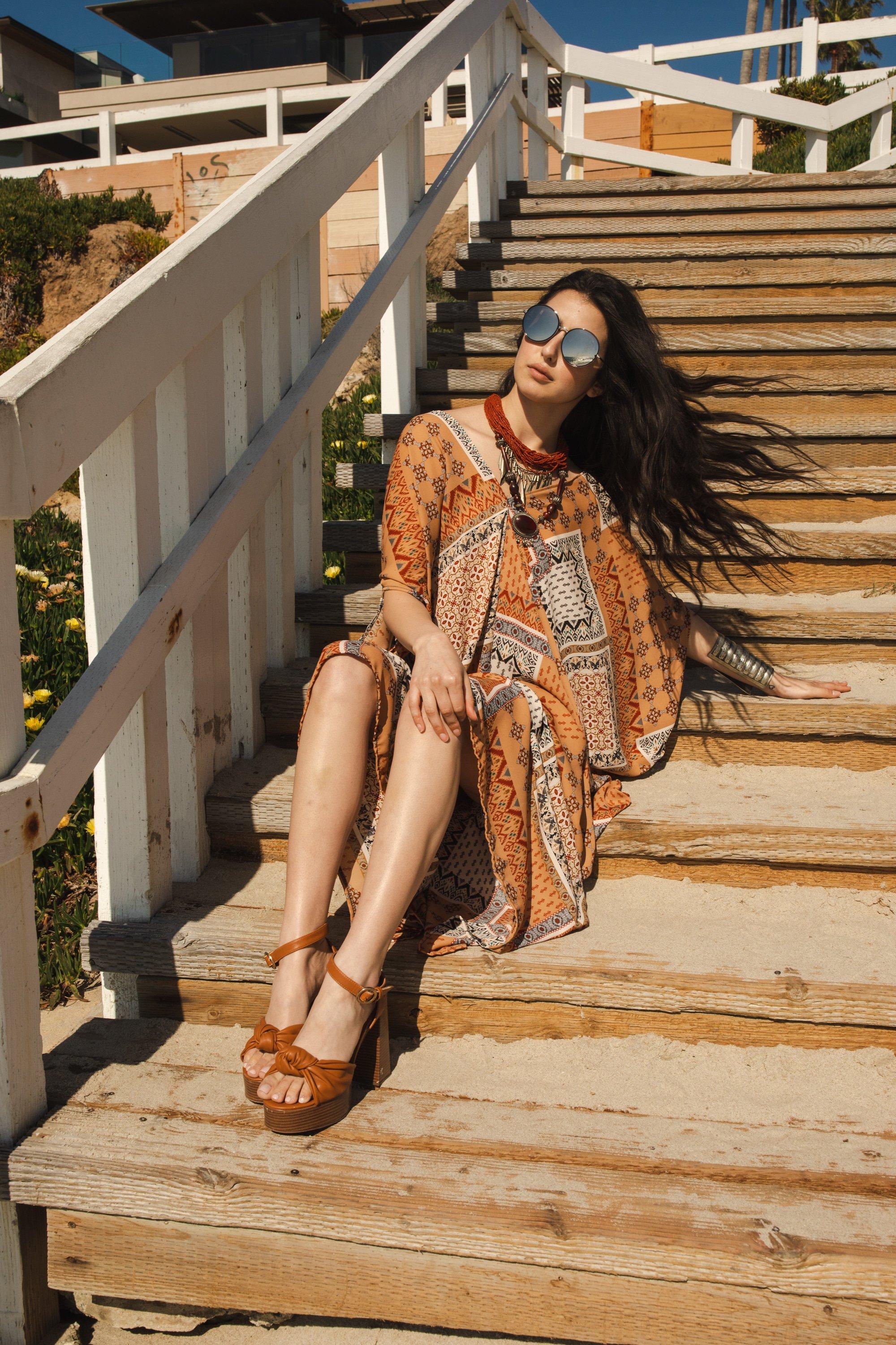 Handmade Hera Caftan by Jennafer Grace featuring intricate embroidery and flowing fabric, perfect for elegant, comfortable wear.