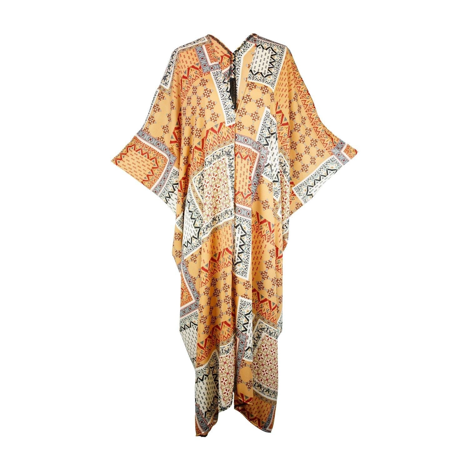 Jennafer Grace Hera Caftan in vibrant fabric, featuring flowing design and elegant draping, perfect for stylish everyday wear.