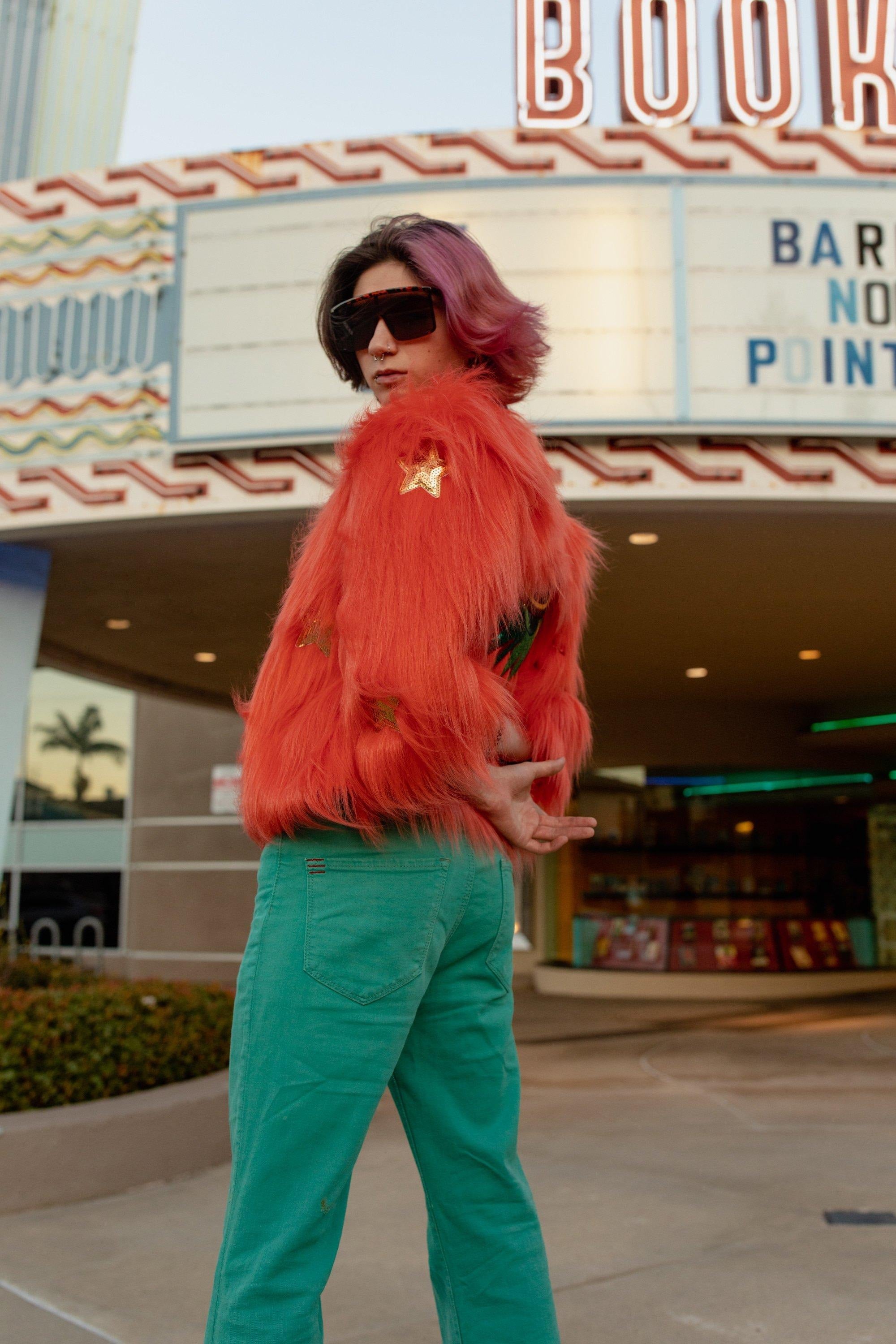 Jennafer Grace Planet Queen orange faux fur jacket, handmade warm outerwear with plush orange fur and stylish design.