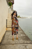 Handmade Jennafer Grace Actius Caftan in vibrant rouge, flowing kaftan dress with intricate details and elegant design.