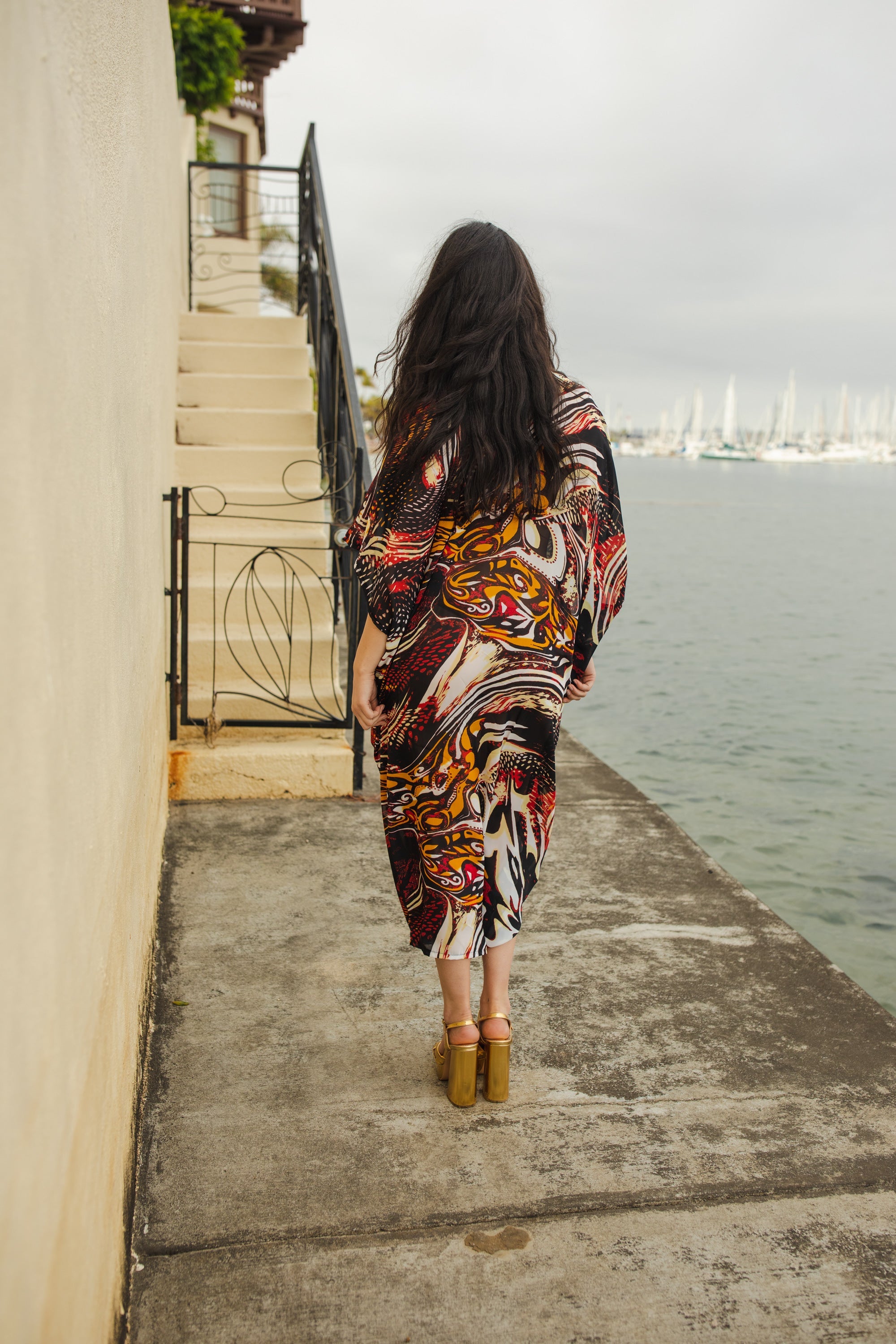 Handmade Jennafer Grace Actius Caftan in vibrant rouge, flowing kaftan dress with intricate design and relaxed fit.