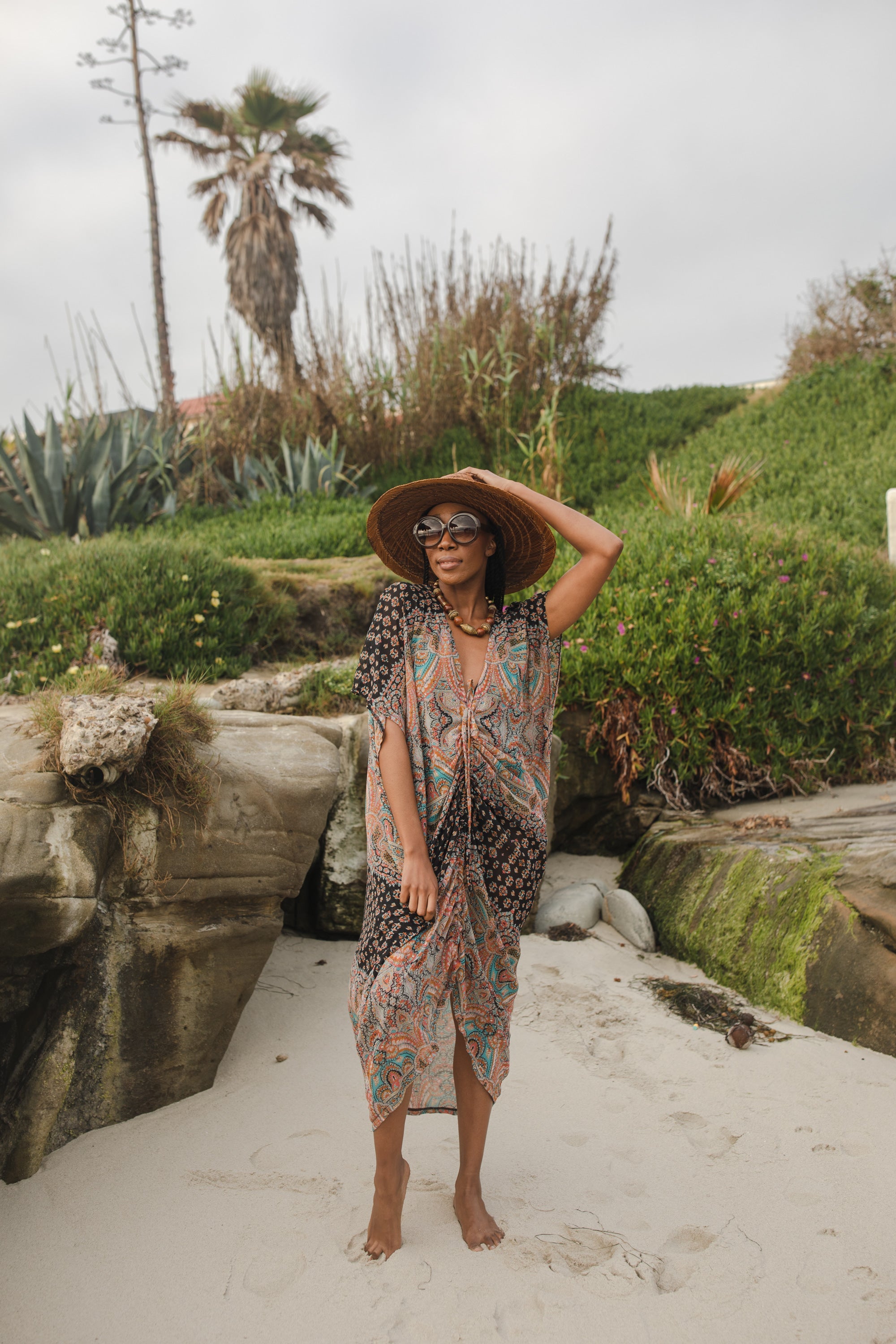 Jennafer Grace Actius Caftan Dress in Taj, elegant bohemian kaftan with intricate embroidery, flowing fabric, and vibrant design.