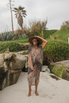 Jennafer Grace Actius Caftan Dress in Taj, elegant bohemian kaftan with intricate embroidery, flowing fabric, and vibrant design.
