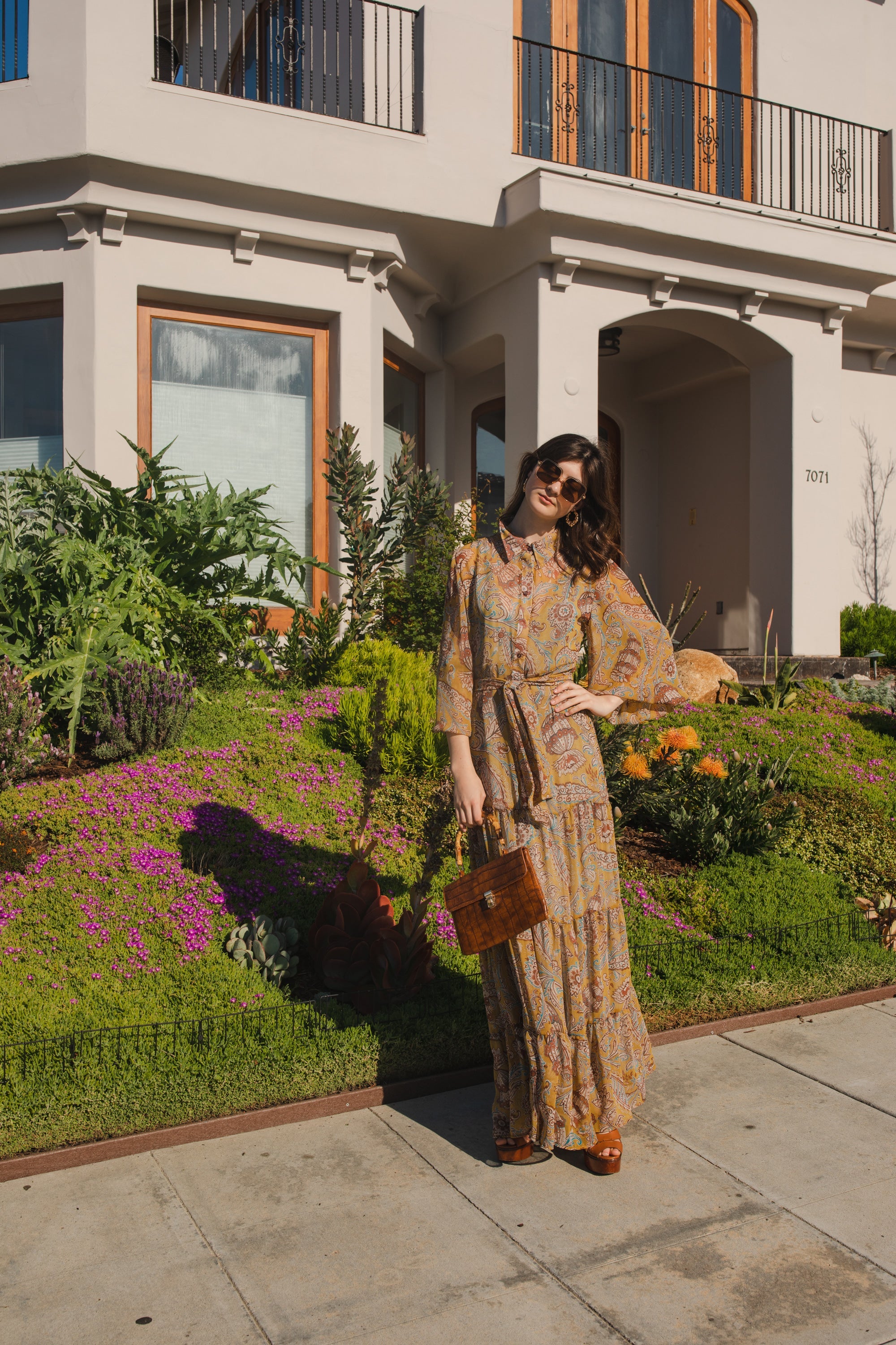 Jennafer Grace Agnes Bookie Maxi Dress featuring a flowing fabric and elegant design, perfect for casual or formal wear.
