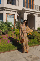 Jennafer Grace Agnes Bookie Maxi Dress featuring a flowing fabric and elegant design, perfect for casual or formal wear.
