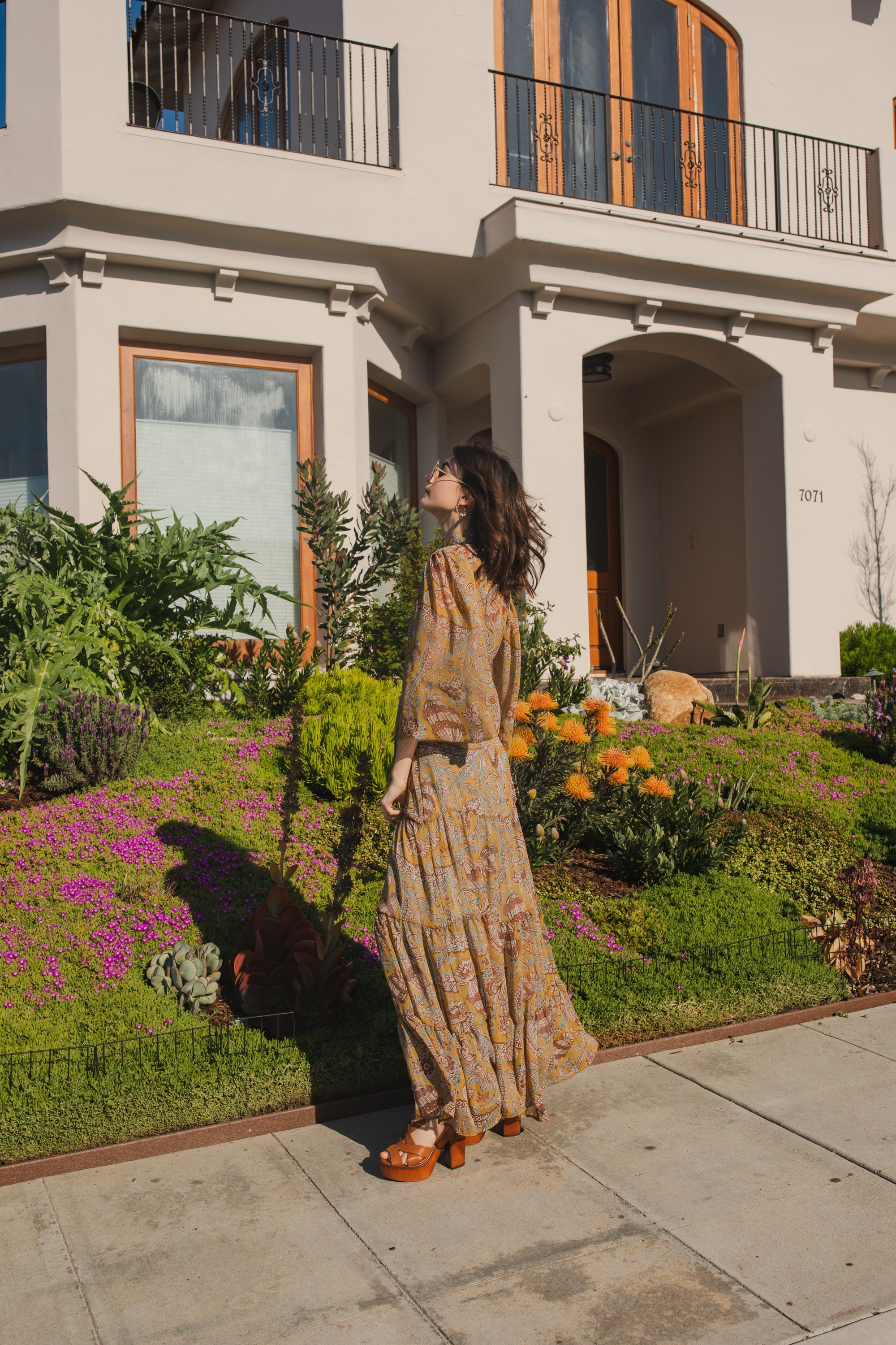 Jennafer Grace Agnes Bookie Maxi Dress featuring a flowing fabric and elegant design, ideal for casual or formal occasions.