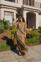 Jennafer Grace Agnes Bookie Maxi Dress featuring a flowing silhouette and intricate handmade details, perfect for elegant occasions.