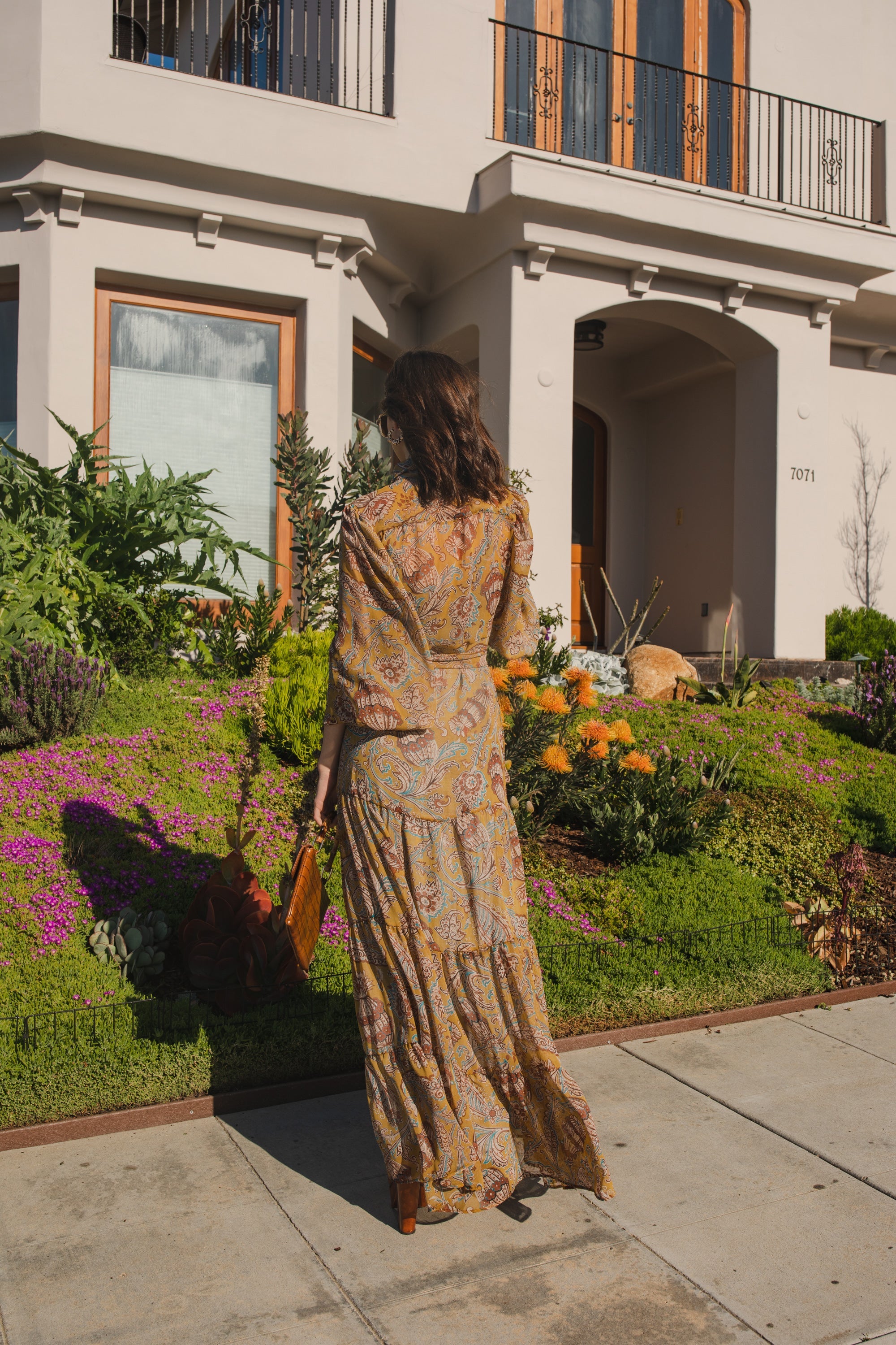 Handmade Jennafer Grace Agnes Bookie Maxi Dress featuring a flowing silhouette and intricate floral patterns.