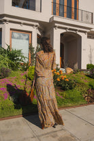 Handmade Jennafer Grace Agnes Bookie Maxi Dress featuring a flowing silhouette and intricate floral patterns.