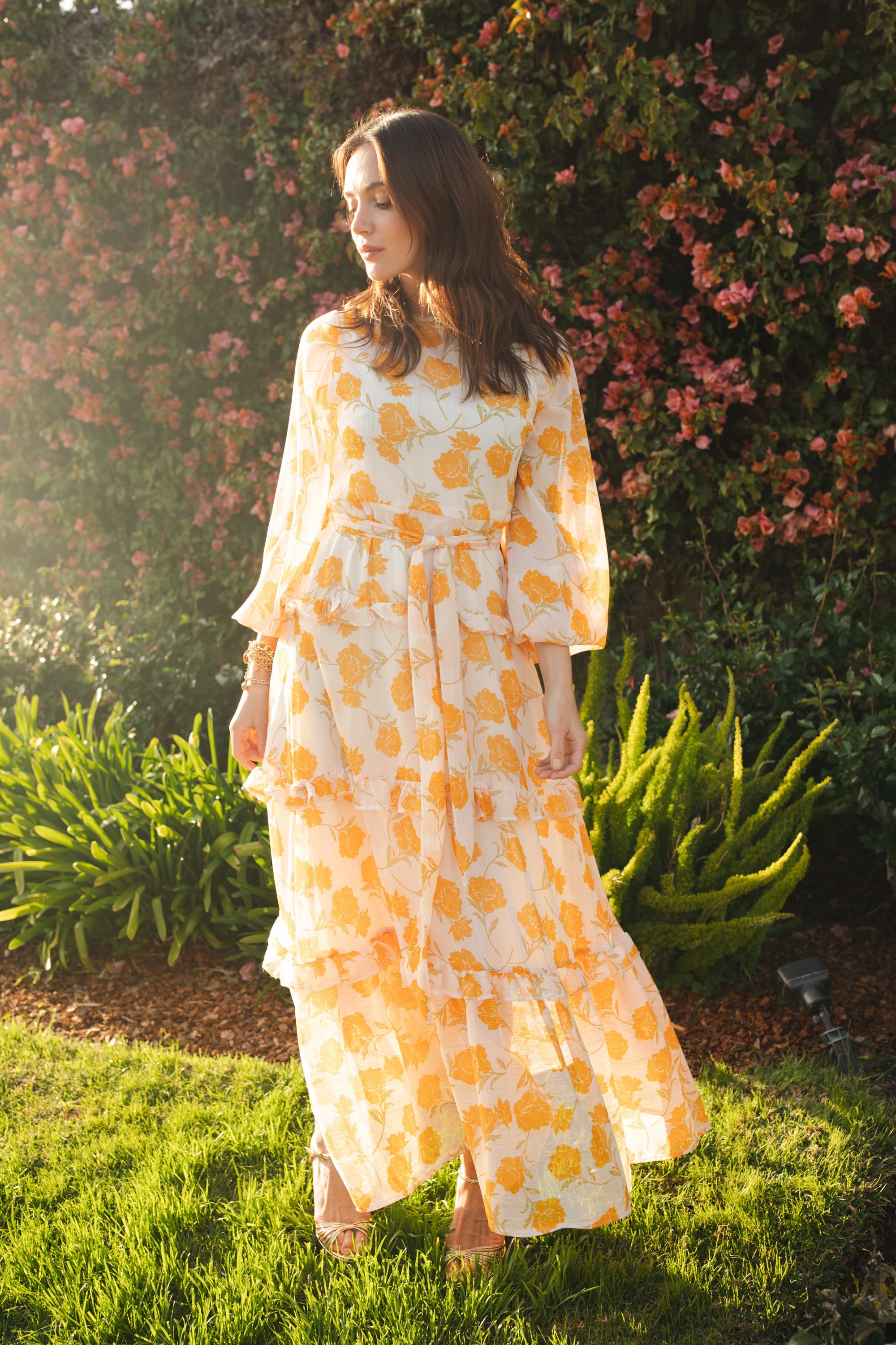Jennafer Grace Amarillo Love Maxi Dress in bright yellow with flowing fabric and sleeveless design, perfect for summer occasions.