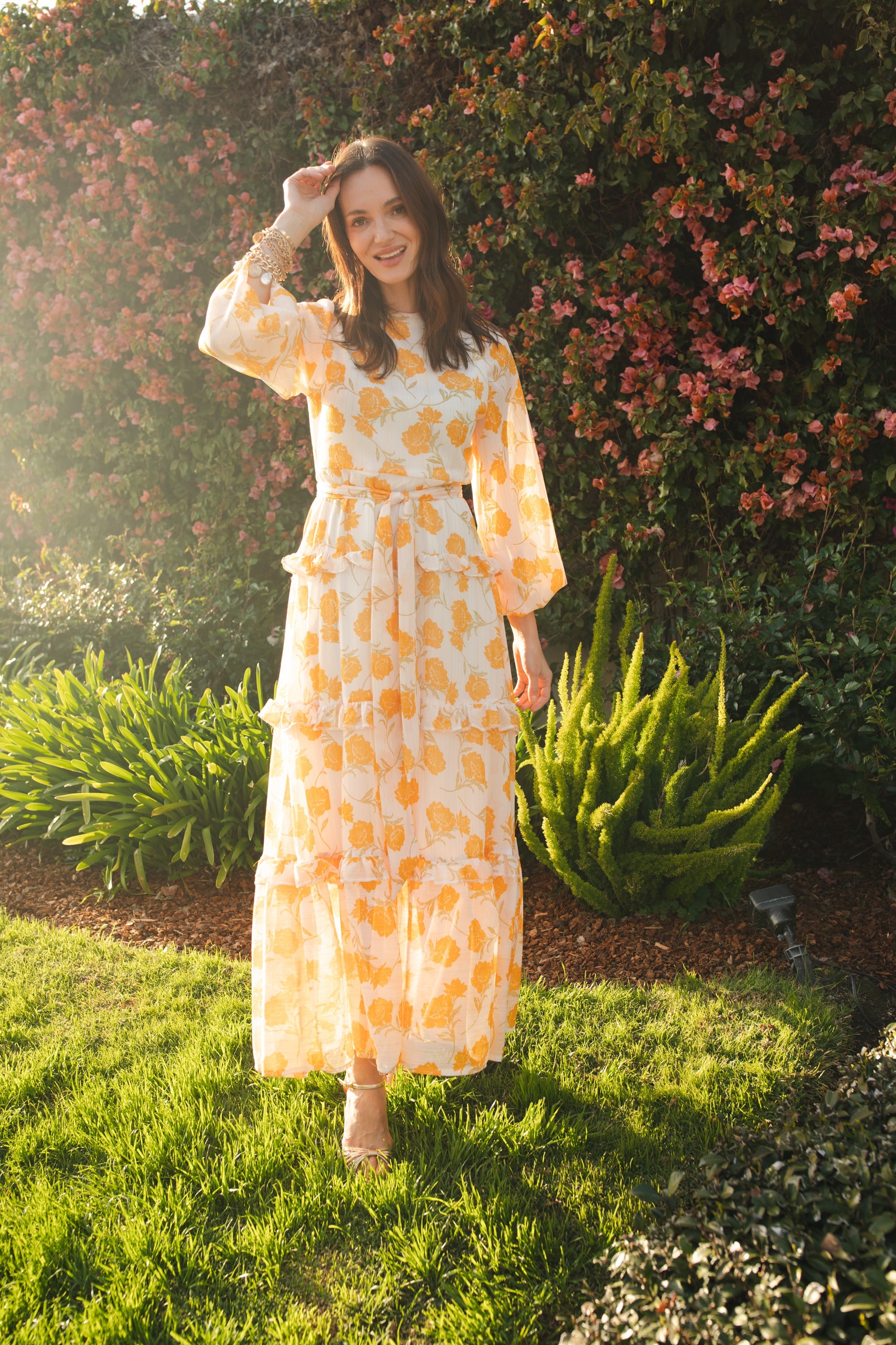 Jennafer Grace Amarillo Love maxi dress featuring vibrant yellow fabric and flowing design, perfect for casual or special occasions.