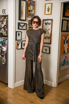 Jennafer Grace Aura Gold Palazzo Pant featuring flowy, gold-toned wide-leg fabric with a relaxed fit and stylish silhouette.