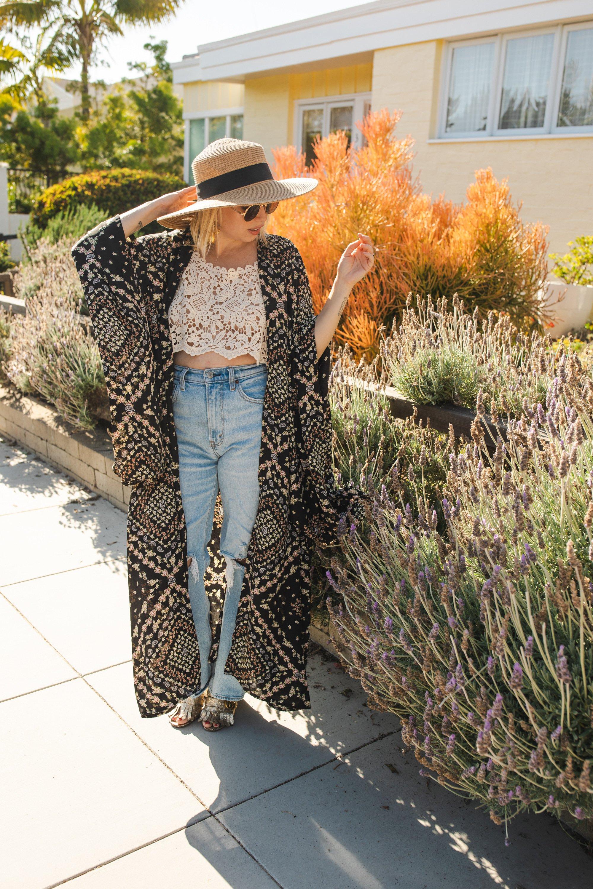Handmade Antoinette Kimono by Jennafer Grace with floral patterns and flowing fabric, shown on a model.