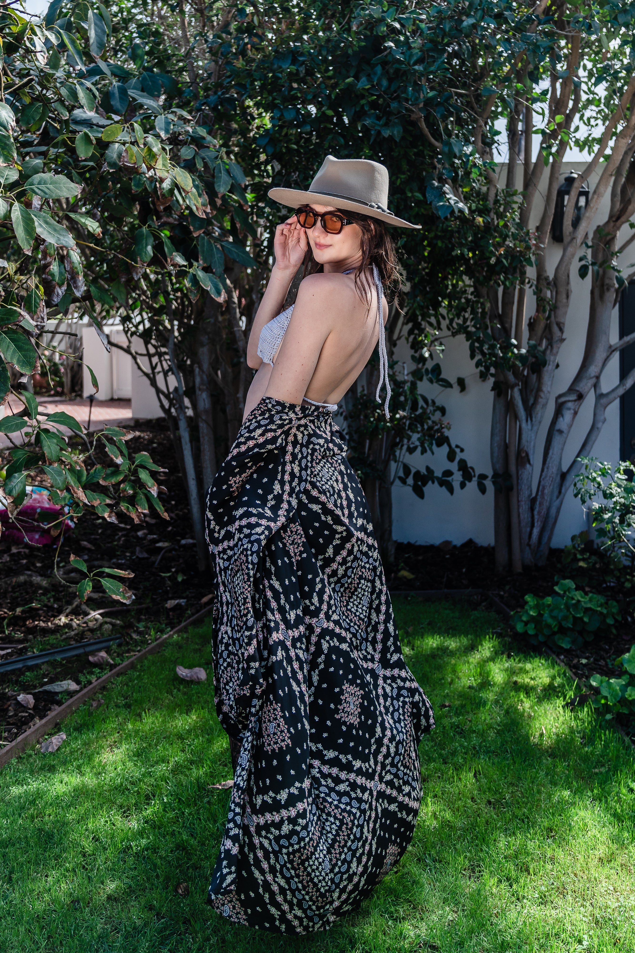 Handmade Antoinette Kimono by Jennafer Grace, featuring intricate crochet details and flowing fabric, styled over a top.