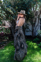 Handmade Antoinette Kimono by Jennafer Grace, featuring intricate crochet details and flowing fabric, styled over a top.