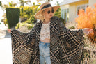 Handmade Antoinette Kimono by Jennafer Grace, featuring intricate designs and flowing fabric, displayed on a model.