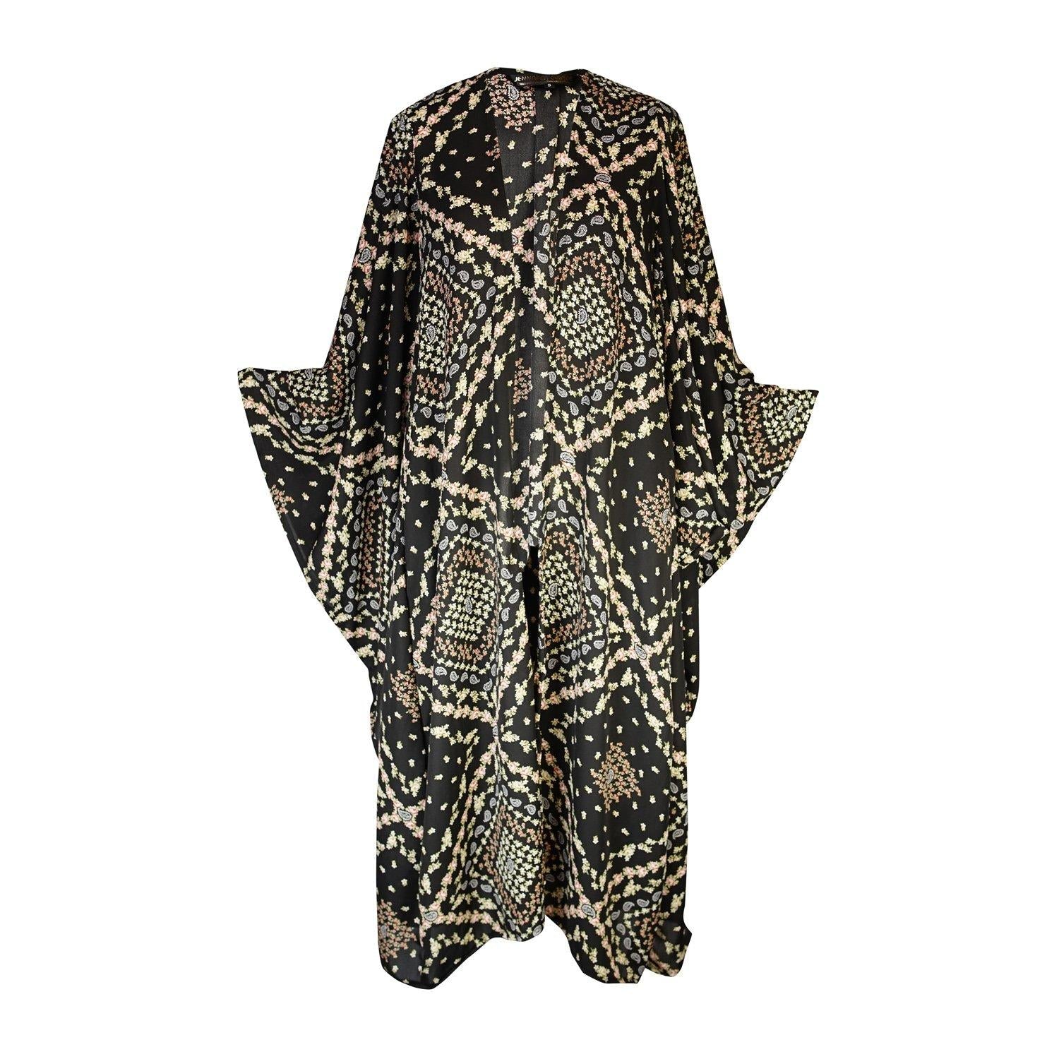 Jennafer Grace Antoinette Kimono with floral pattern, lightweight fabric, long sleeves, and open front design displayed flat.