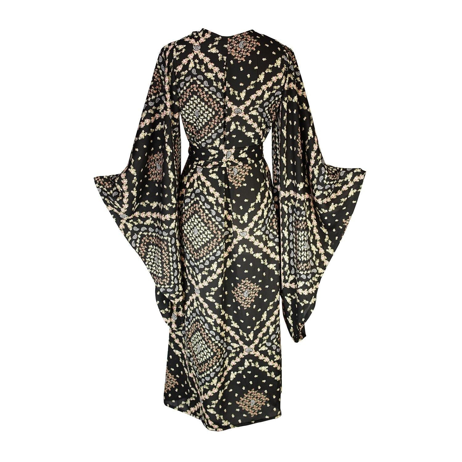Jennafer Grace Antoinette Kimono with floral pattern, lightweight fabric, and wide sleeves, displayed flat on a white background.
