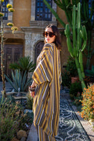 Bank striped tunic caftan set with matching palazzo pants by Jennafer Grace, featuring a relaxed fit and stylish design.