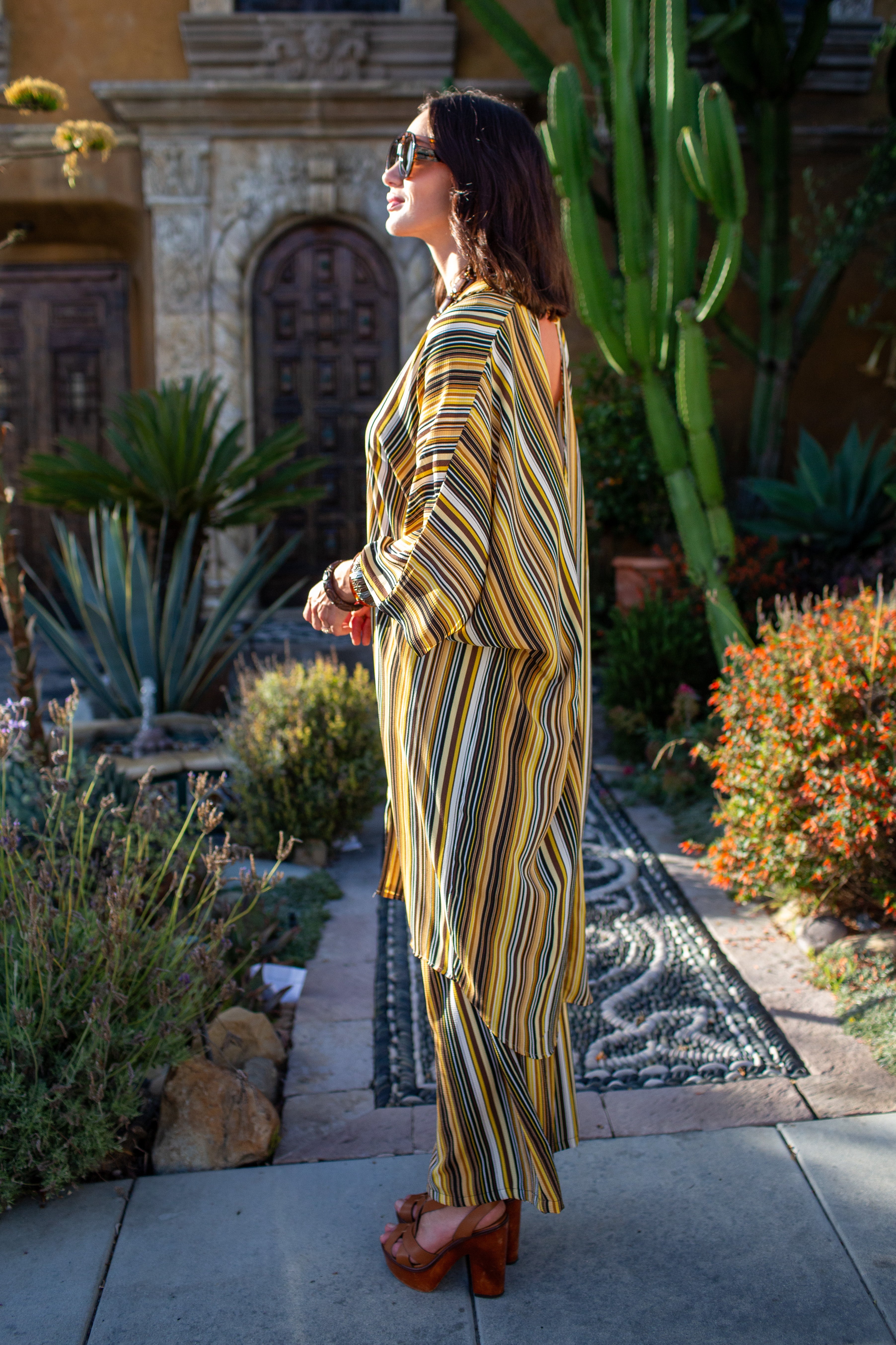 Bank striped tunic and caftan set by Jennafer Grace featuring a relaxed fit, paired with matching palazzo pants, stylish and comfortable.