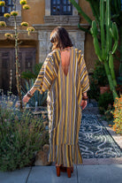 Bank striped tunic caftan set with matching palazzo pants by Jennafer Grace, featuring a relaxed fit and bold stripe pattern.