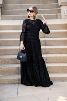 Black sequin lace ruffle dress by Jennafer Grace featuring intricate lace details and flowing ruffle design, handmade elegance.