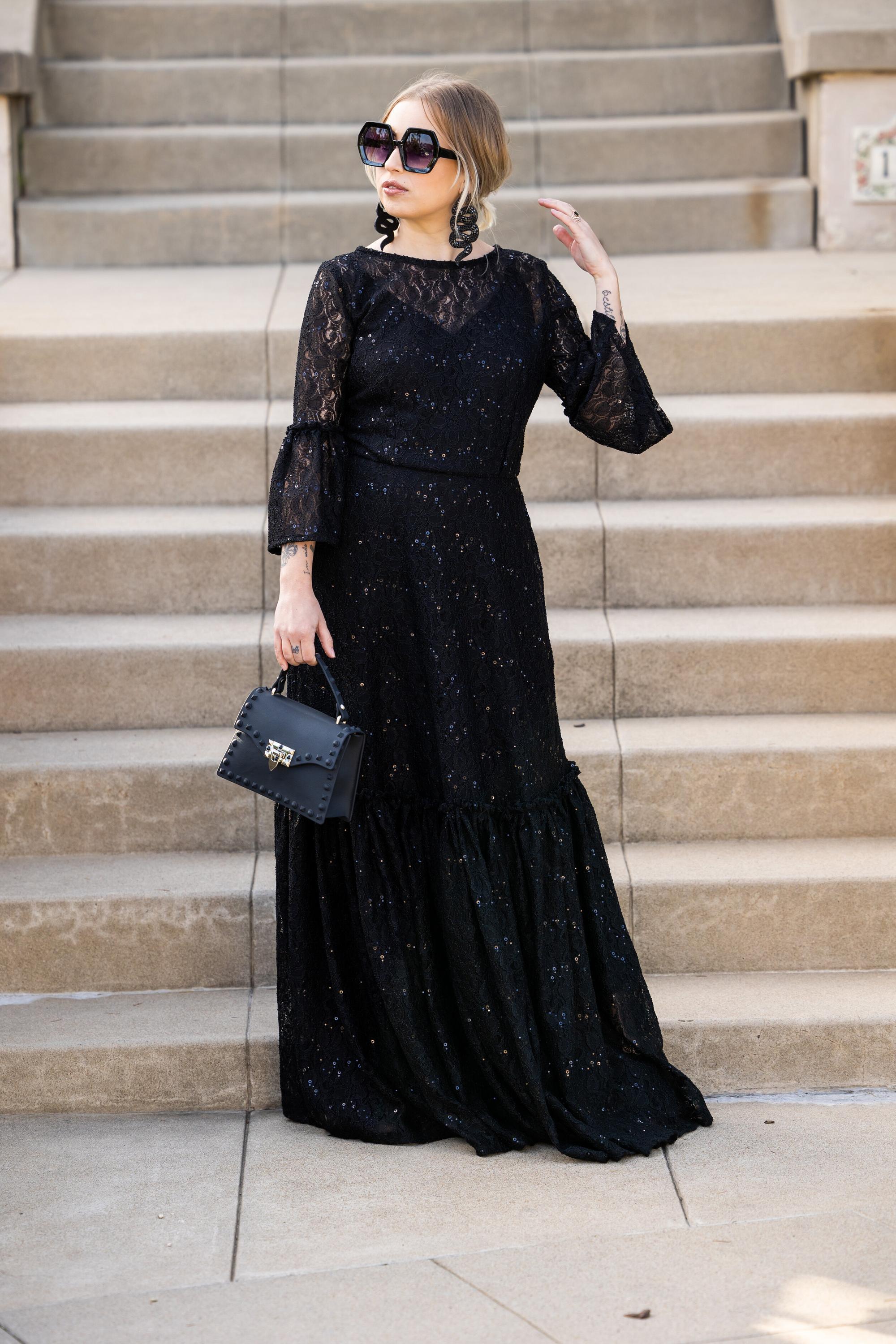 Black sequin lace ruffle dress by Jennafer Grace featuring intricate lace details and flowing ruffle design, handmade elegance.