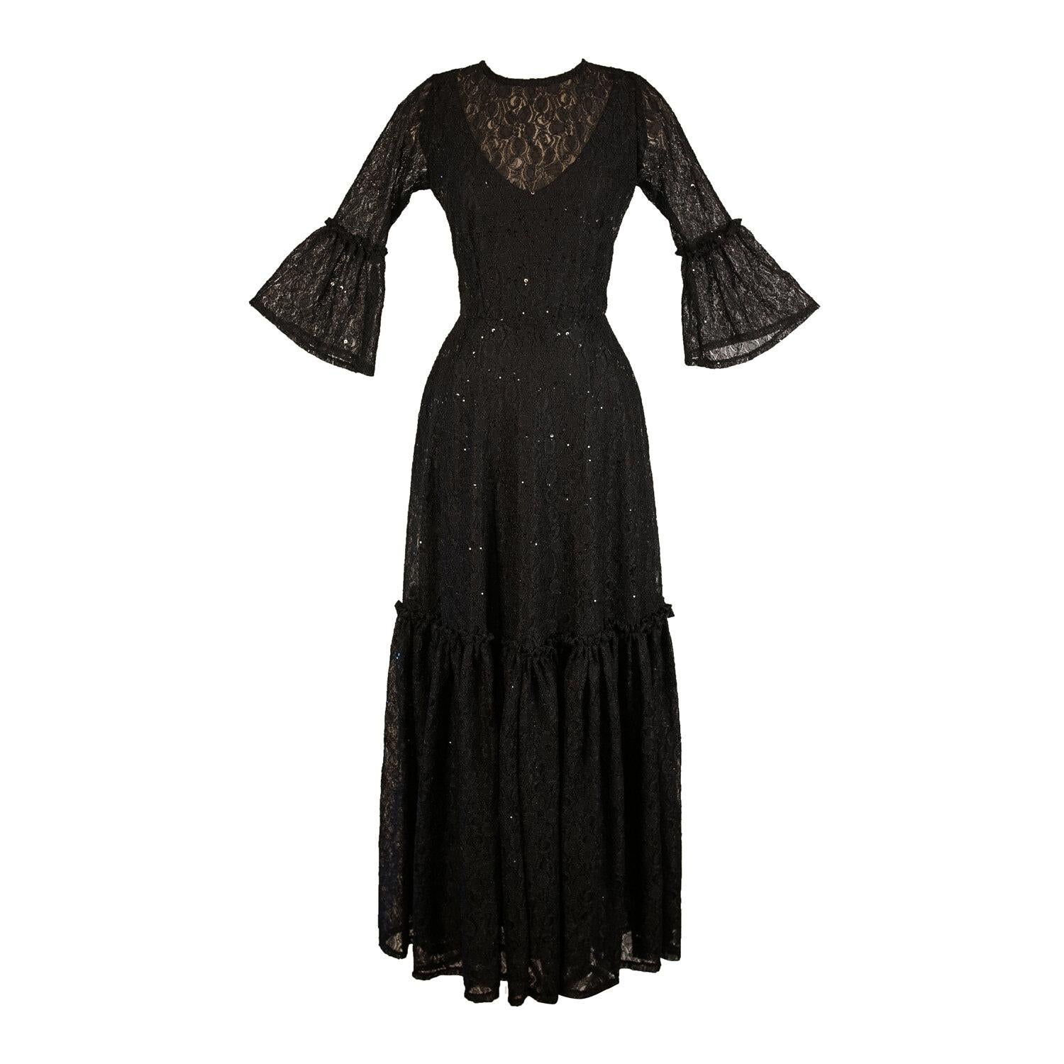 Black sequin lace ruffle dress by Jennafer Grace, featuring intricate lace details and elegant ruffle accents.
