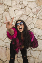 Jennafer Grace Planet Queen faux fur jacket in vibrant monster pink, showcasing the plush, handmade design and bright color.