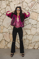 Jennafer Grace Planet Queen faux fur jacket in vibrant monster pink, handmade with plush texture and stylish design.
