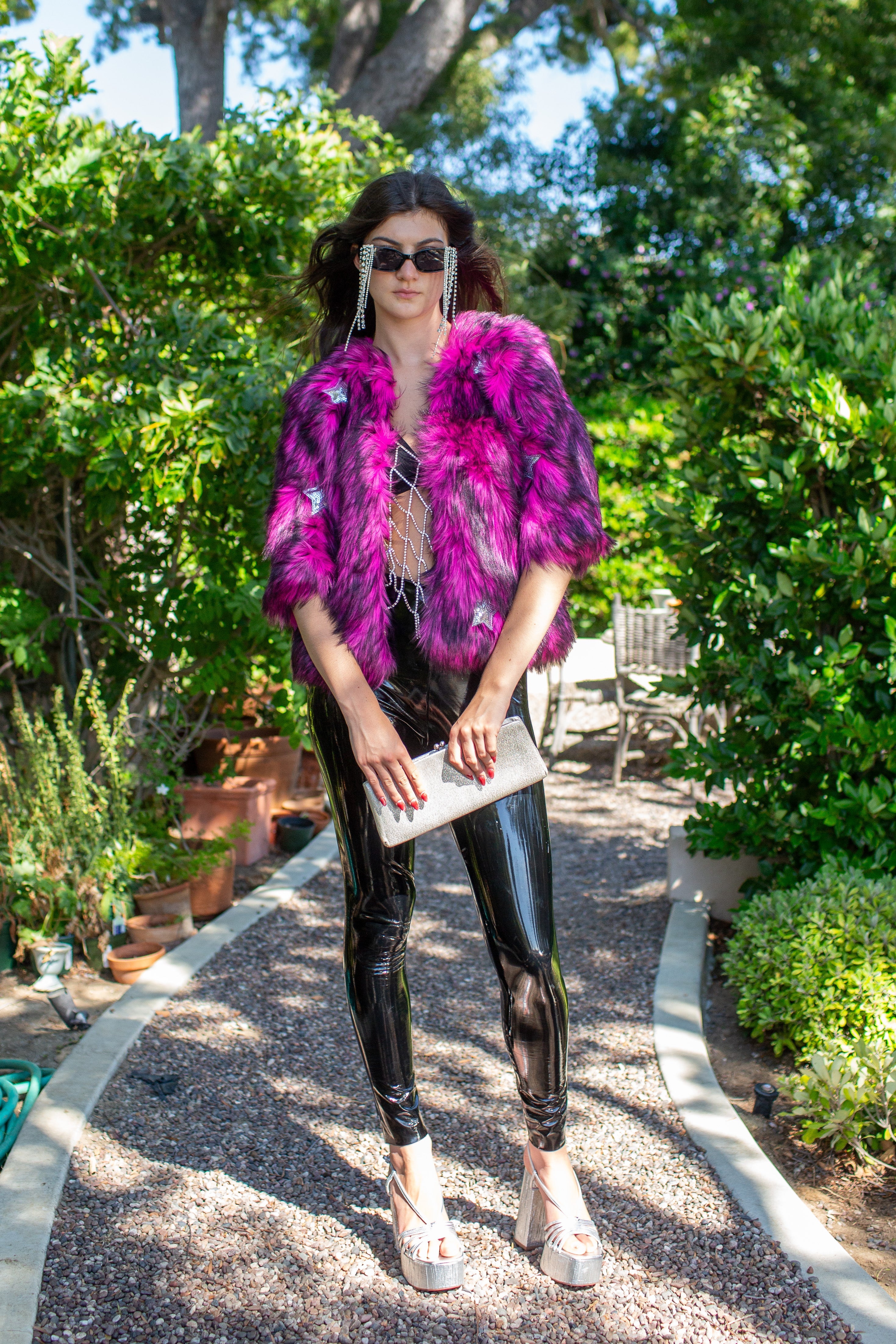 Jennafer Grace Planet Queen faux fur jacket in vibrant monster pink, cozy and stylish for cold weather wear.