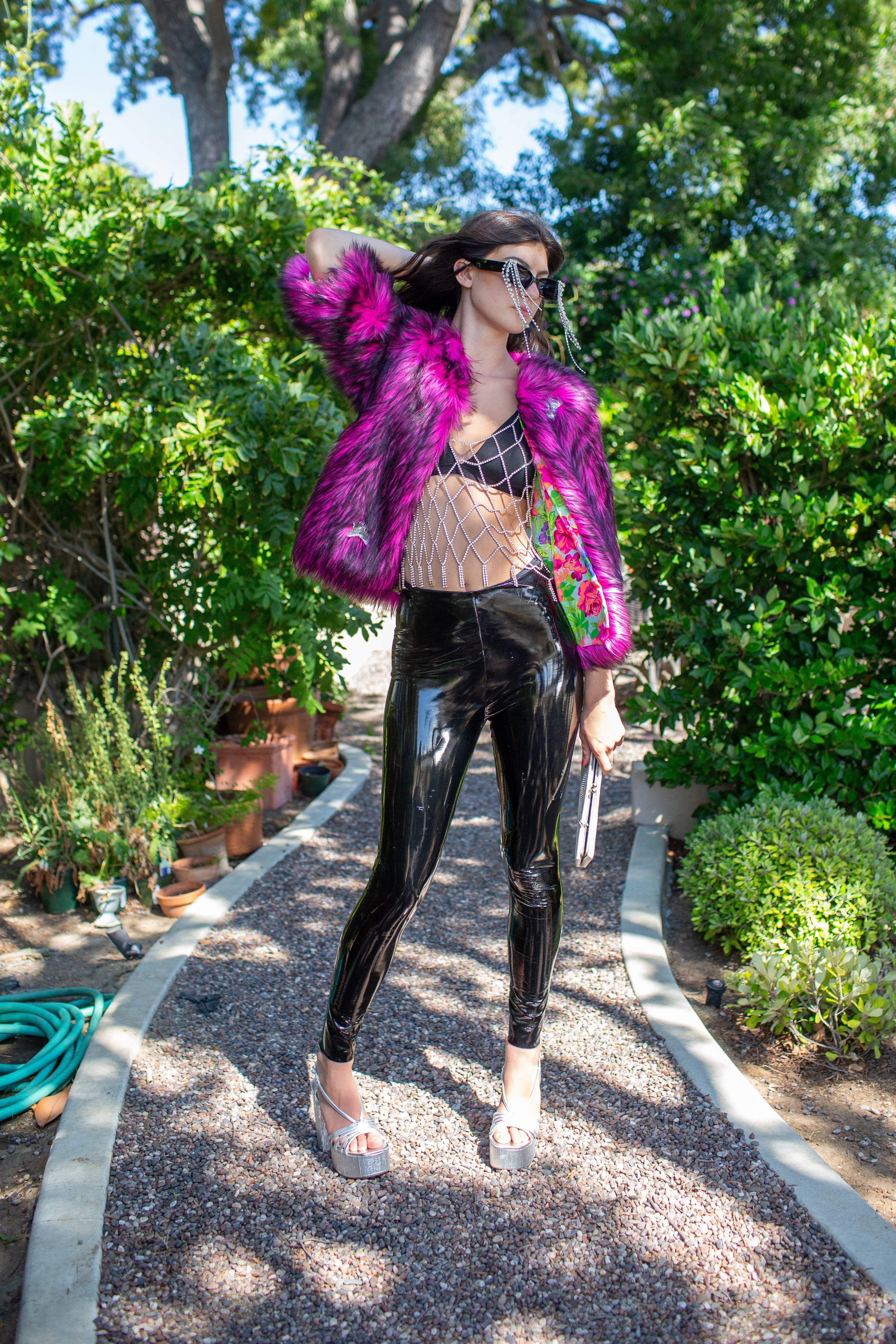 Jennafer Grace Planet Queen faux fur jacket in vibrant monster pink, cozy and stylish for winter wear.