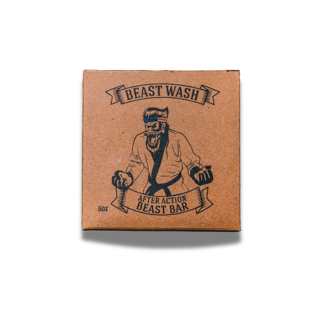 Johnny Slicks After Action Beast Bar soap with natural ingredients, showcasing a rugged, earthy appearance in a close-up shot.