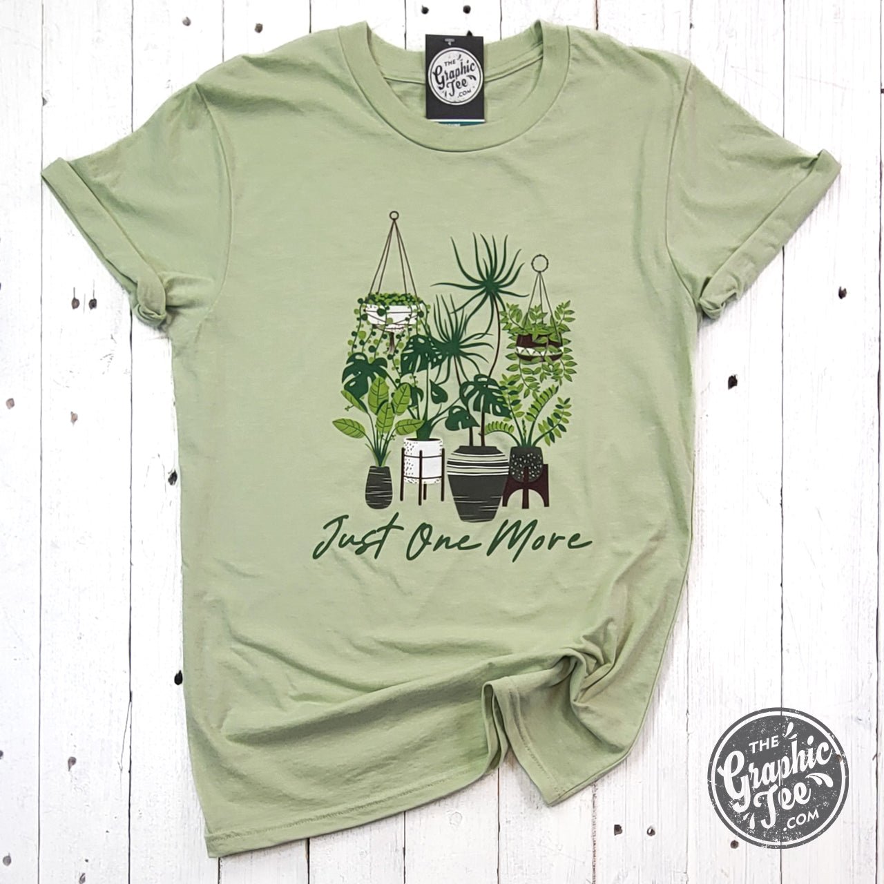 Black Just One More Short Sleeve Tee by The Graphic Tee with a casual graphic design on the front.